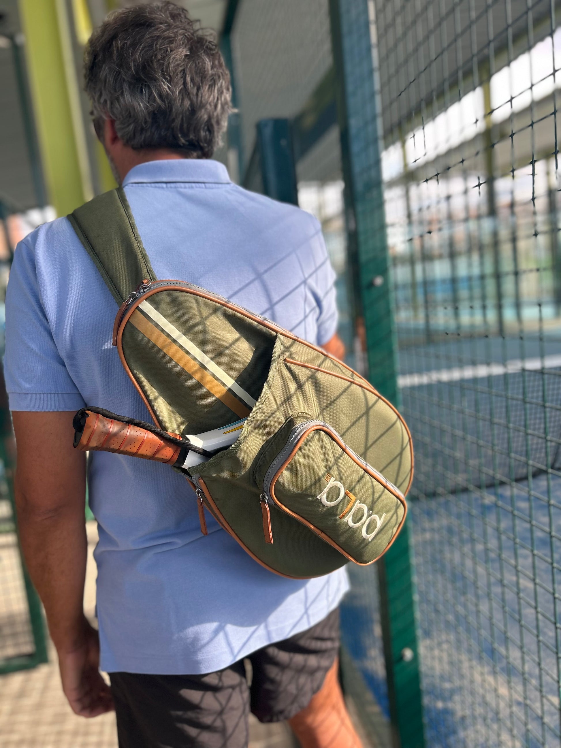 men playing padel with a padel bag