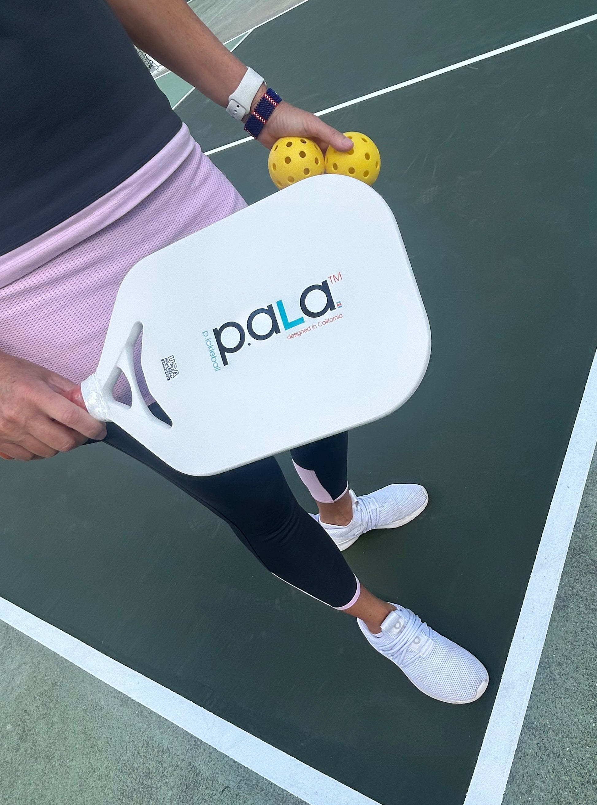 13 mm pickelball racke by p.ala in a pickleball court